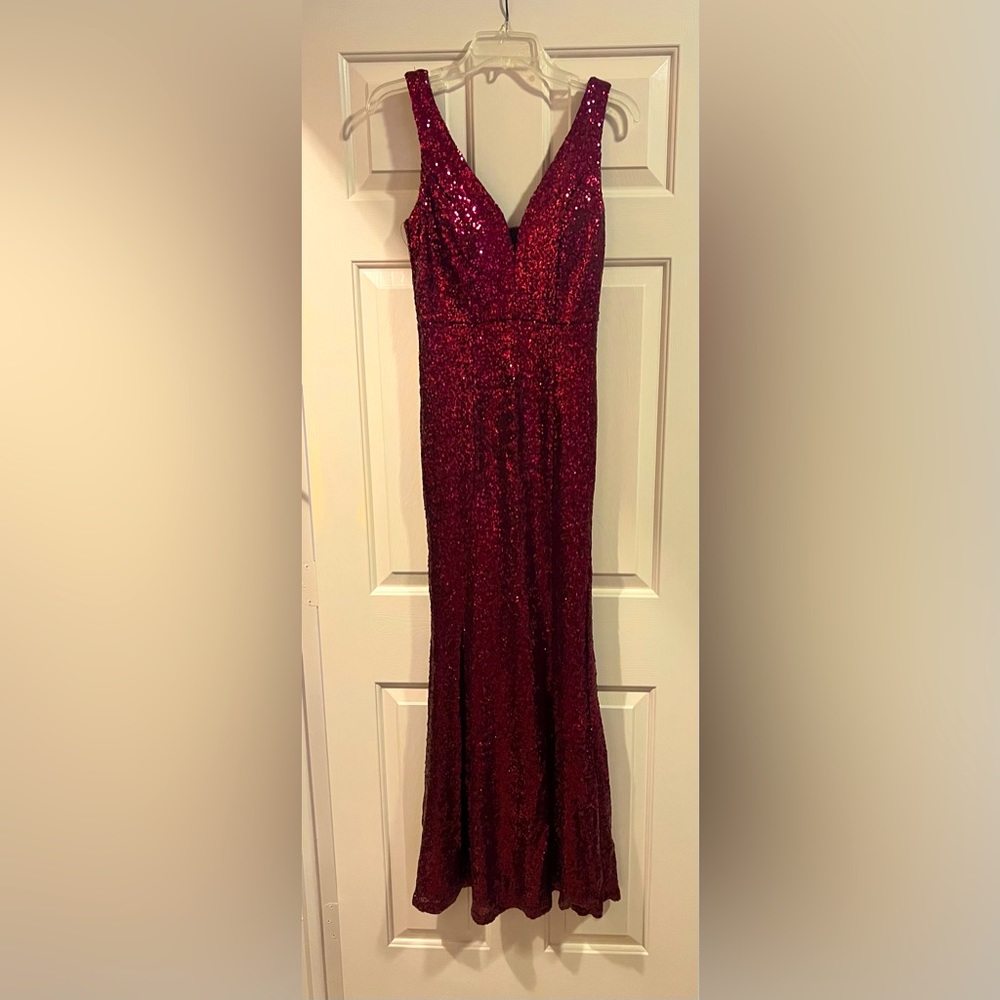 Red sequence sleeveless gown. Jessica Rabbit style.